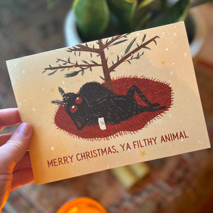 Mothman Christmas Card: Festive Eggnog Sip & Cheeky Greeting!